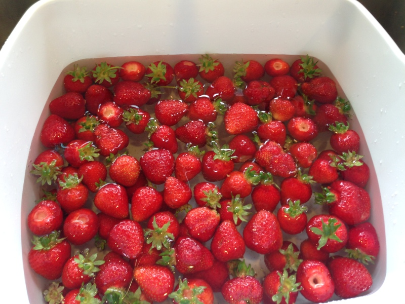 Cleaning my strawberries  in a tub